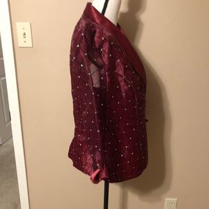 Short sequins and silk shirt.